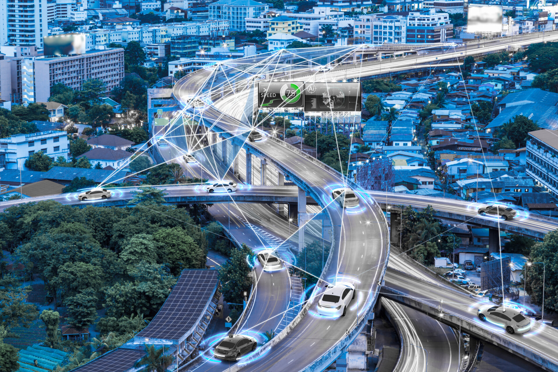 Eine futuristische Stadt mit digitalen Anzeigen auf Autos und Straßen